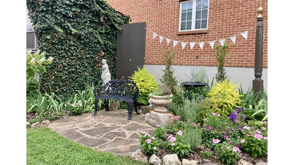 Rod Iron Settee In English Garden Rod Iron Settee In English Garden